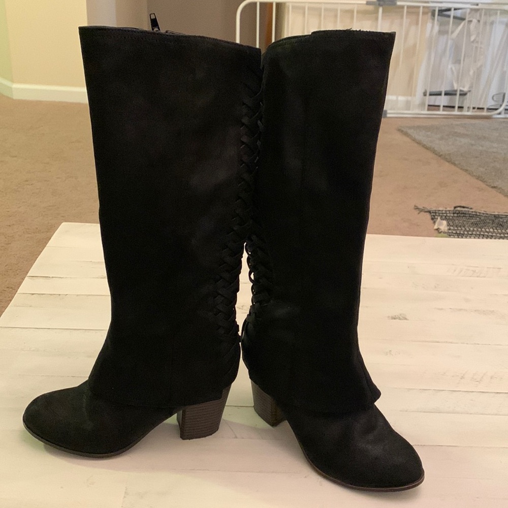 Black Fergalicious tall boots with lace up accent. Size 6 1/2